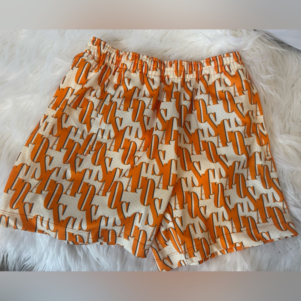 SAGO SMALL White shorts with orange lettering, never worn